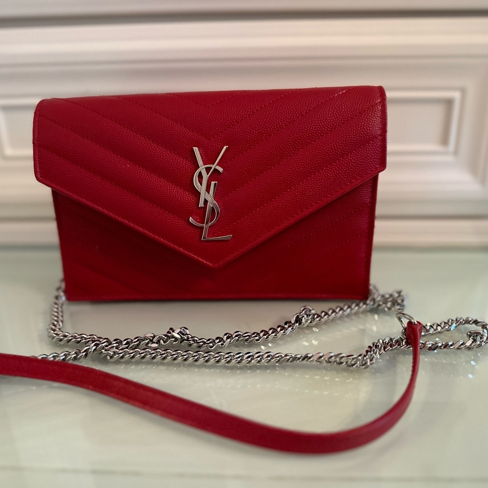 Authentic wallet on a chain silver hardware brand new condition.